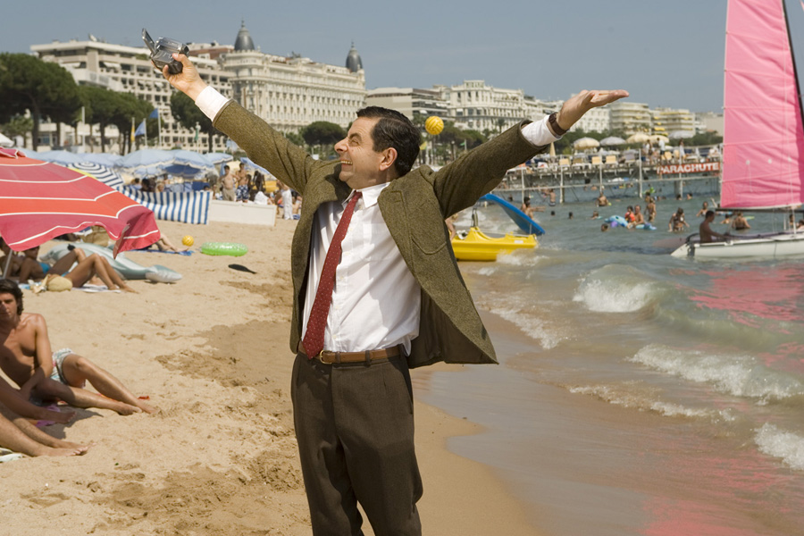 Rowan Atkinson as Mr. Bean on the beach of Cannes