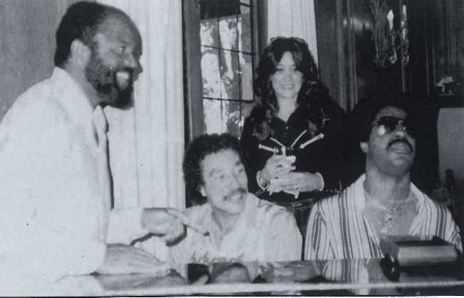 Berry Gordy, Smokey Robinson, Charlene and Stevie Wonder circa 1977.