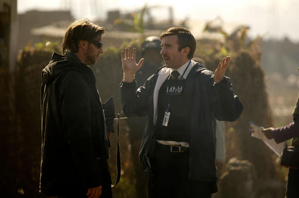 Neill Blomkamp discusses a scene with star Sharlto Copley on the set of 'District 9.'