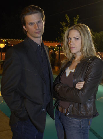 Fred Weller and Mary McCormack in the series 'In Plain Sight.'