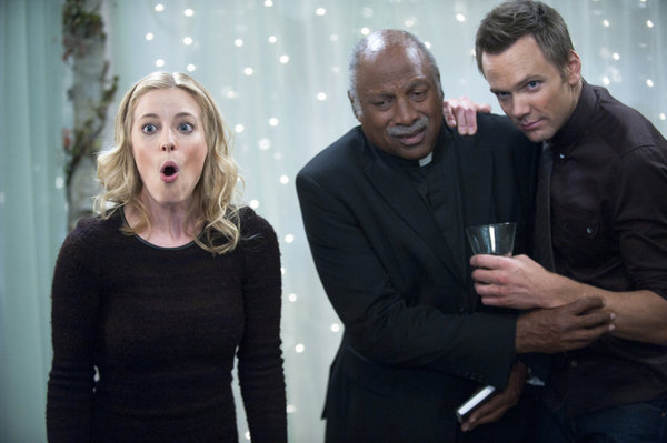 COMMUNITY -- "Urban Matrimony and the Sandwich Arts" Episode 312 -- Pictured: (l-r) Gillian Jacobs as Britta, Charles Walker as Minister, Joel McHale as Jeff -- Photo by: Lewis Jacobs/NBC 