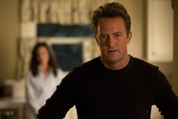GO ON -- "Do You Believe in Ghosts? Yes!" Episode 104 -- Pictured: (l-r) Christine Woods as Janie, Matthew Perry as Ryan King -- (Photo by: Justin Lubin/NBC)