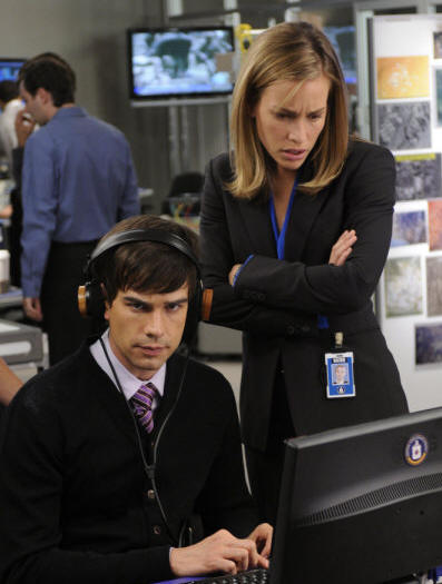 COVERT AFFAIRS -- Episode 101 -- Pictured: (l-r) Christopher Gorham as Auggie Anderson, Piper Perabo as Annie Walker -- Photo by: Steve Wilkie/USA Network