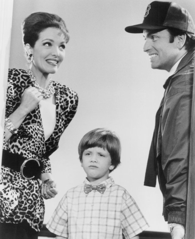 Amy Yasbeck, Michael Oliver and John Ritter in 'Problem Child.'